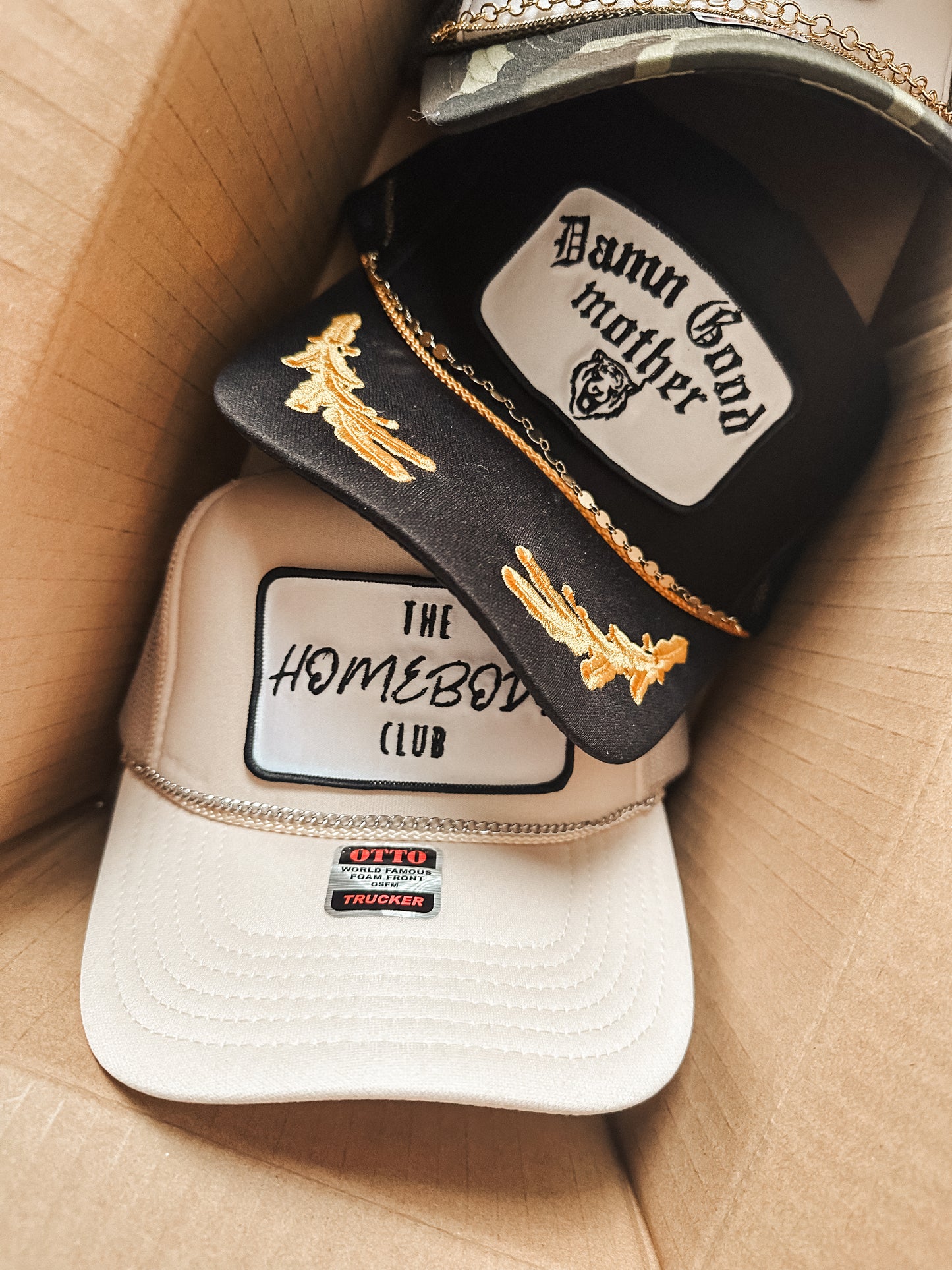 The Homebody Club Trucker Hat Tan/black