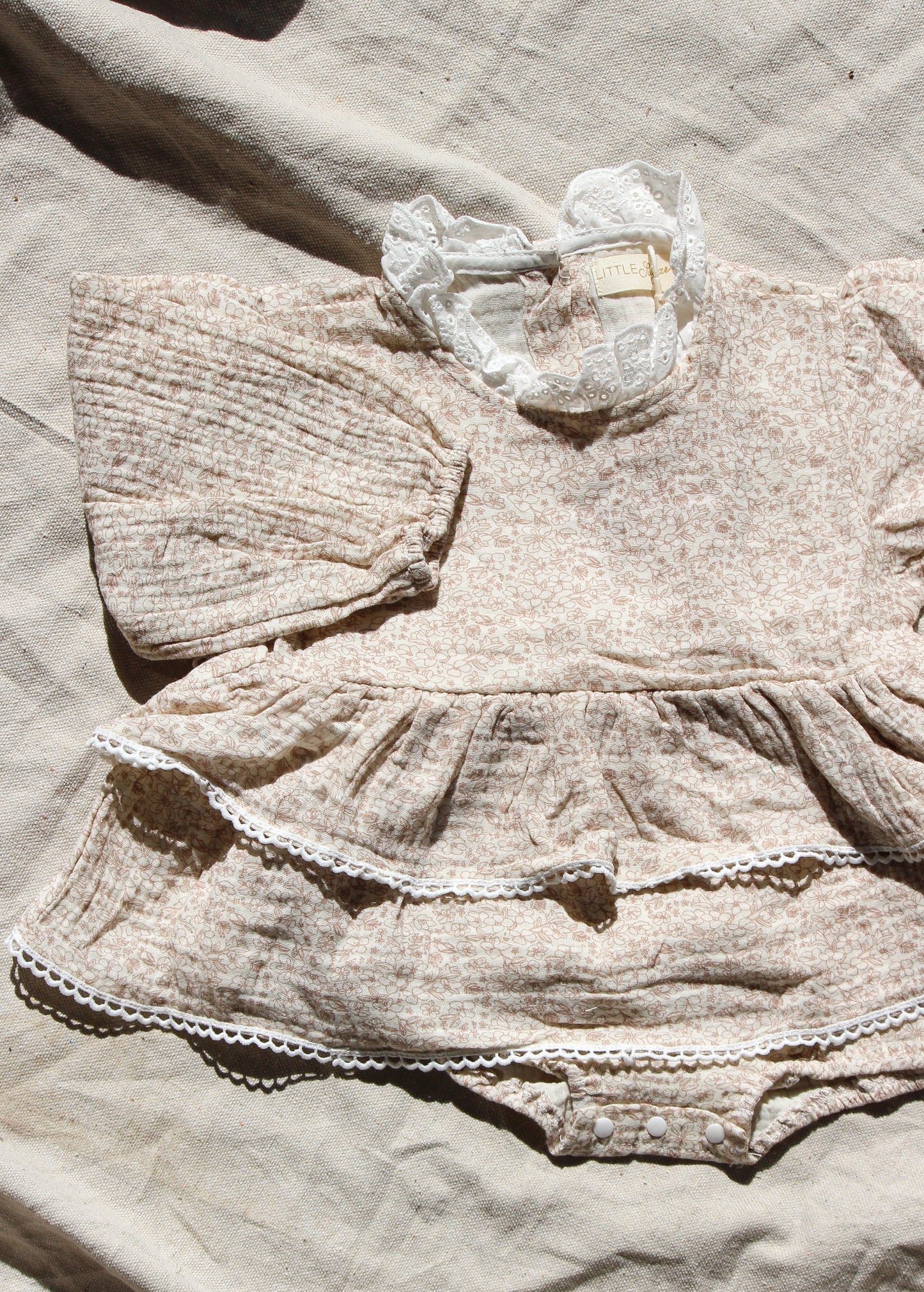 Floral long sleeve romper - brown