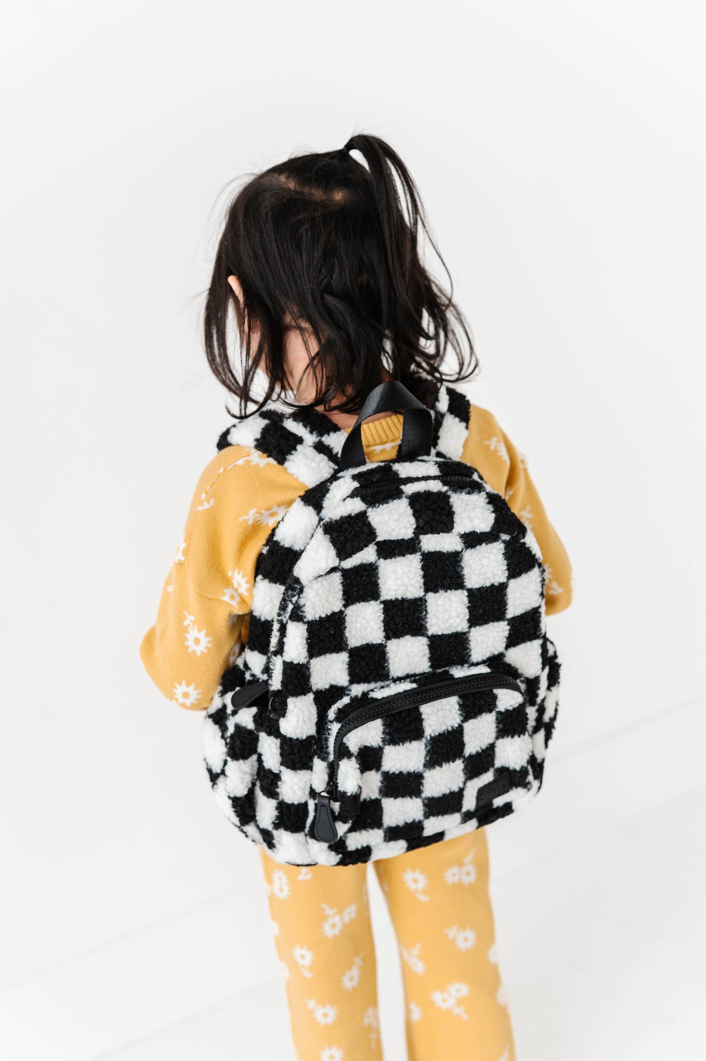 The Aspen Kids Mini Backpack- Sherpa Black and White Check